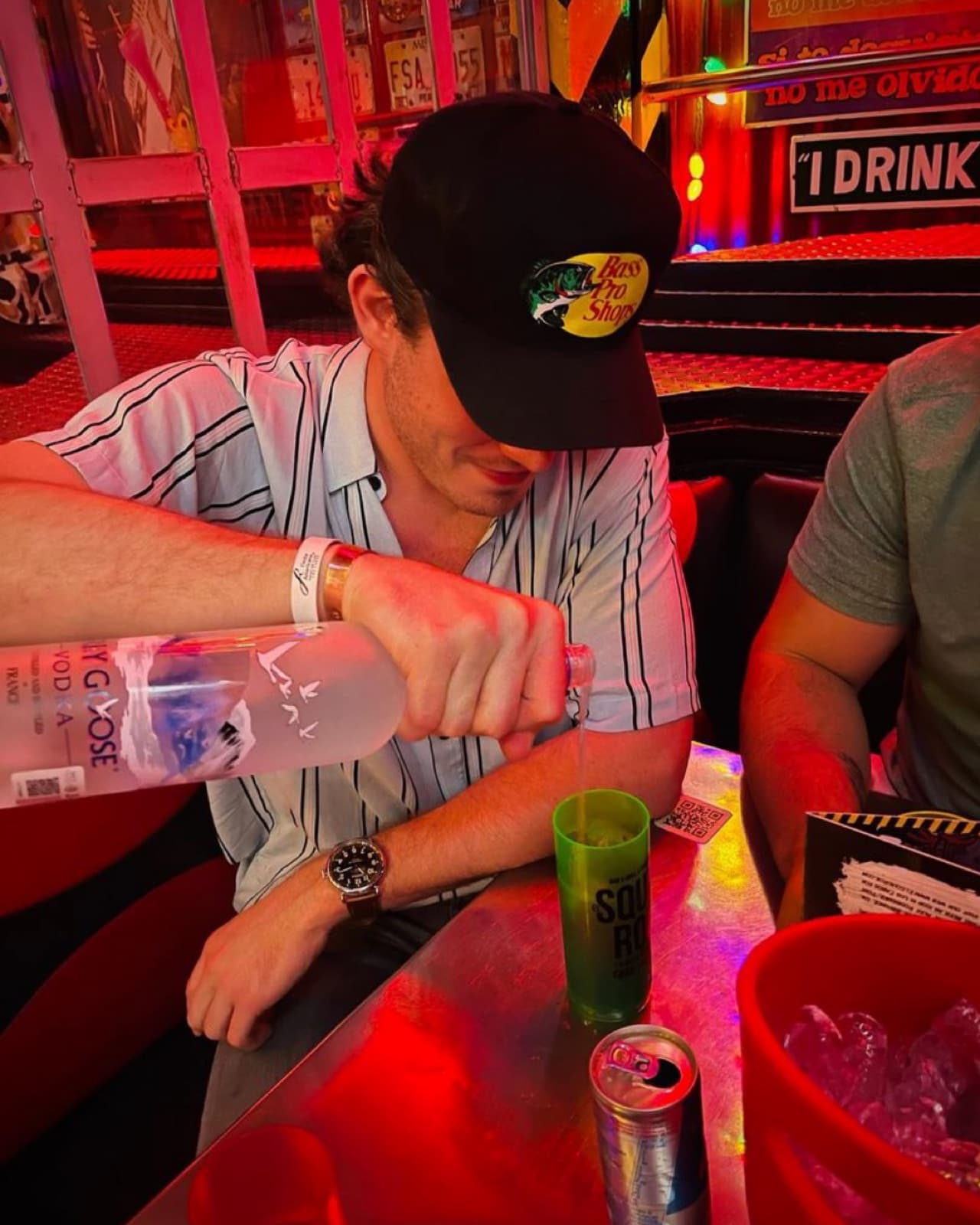 Grey Goose vodka bottle service presentation at El Squid Roe nightclub in Cabo San Lucas